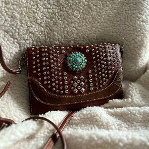 Brown cross body with turquoise